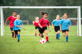 Children playing soccer